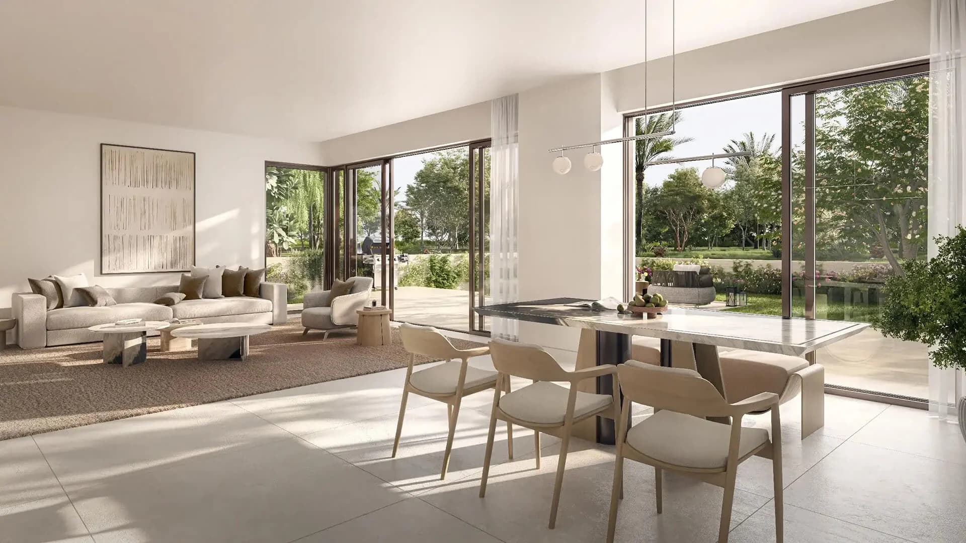 Townhome open-plan living and dining with garden views at Bayn by Ora, Ghantoot, between Abu Dhabi and Dubai