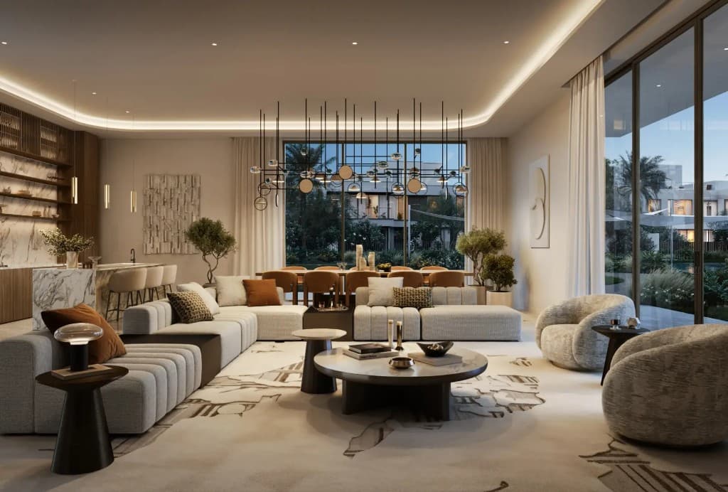 Address Villas Tierra open-plan living and dining room with floor-to-ceiling glass and views to the pool